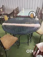 Round Glass-top Dining Table With Metal Chairs (D6) On Rent
