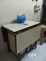 Foldable dining table, made out of pure wood
