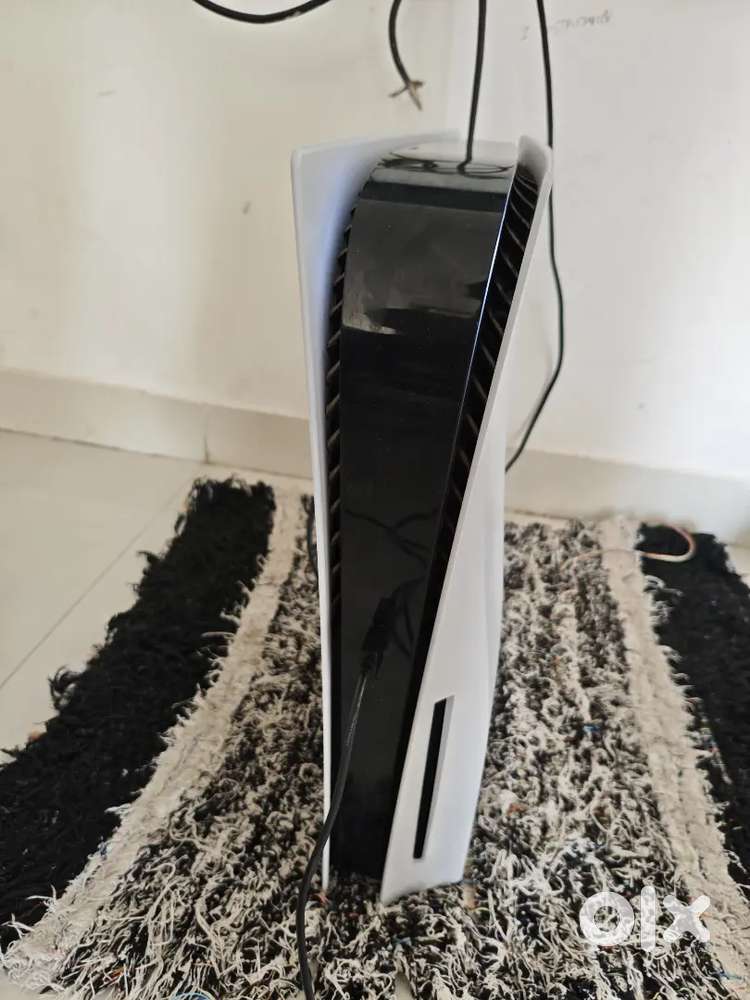 Sony PlayStation 5 with 4 Games