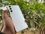 Sumsung s22 mobile phone white color and 2 year old but new condition