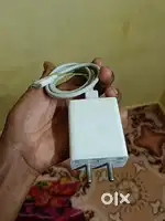 Original 18w charger with cable.