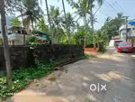 Vazhayila 18 Cent Square Land For Sale.. Main Road to Easy Access..