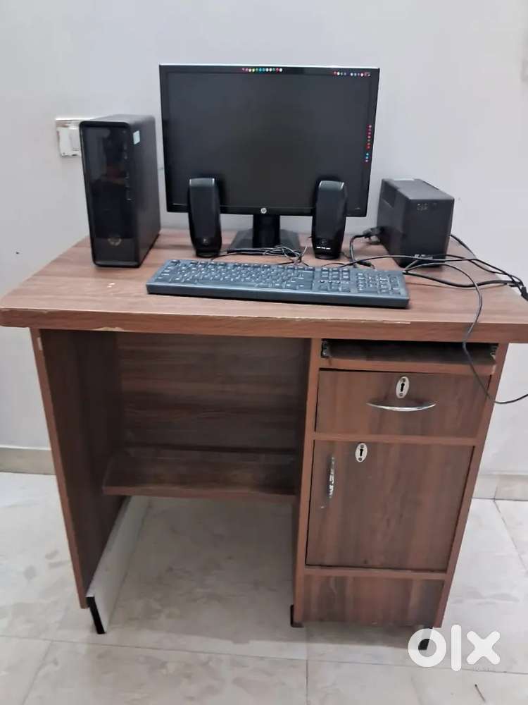 Personal computer with chair and table