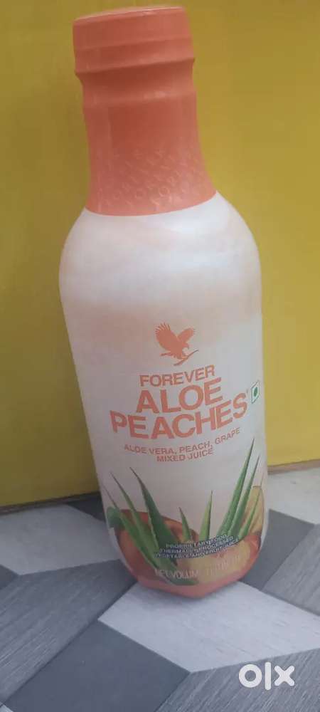 Forever Aloe peaches grape mixed juice