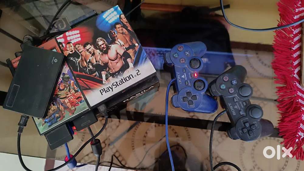 Playstation 2 with 100+ games and 2 joystick 1 memory card