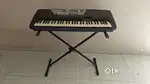 Yamaha keyboard / Piano with stand
