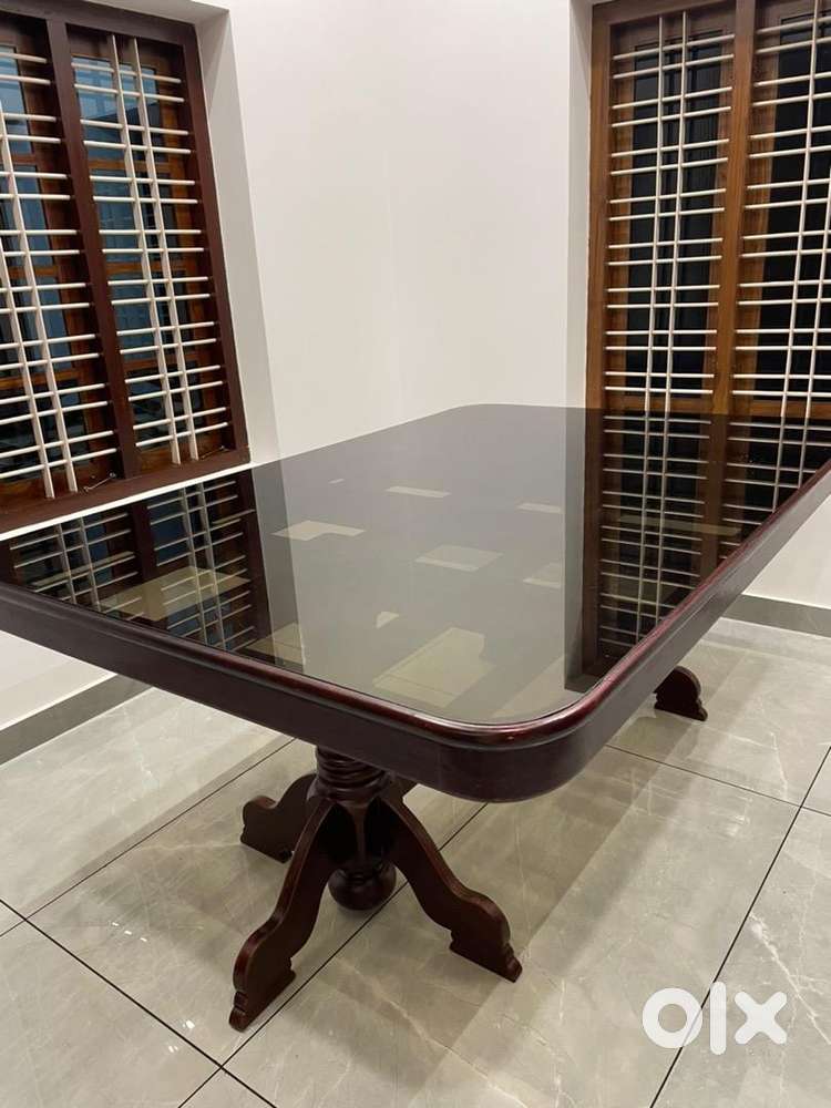 Good contioned well furnished dining table completely wood
