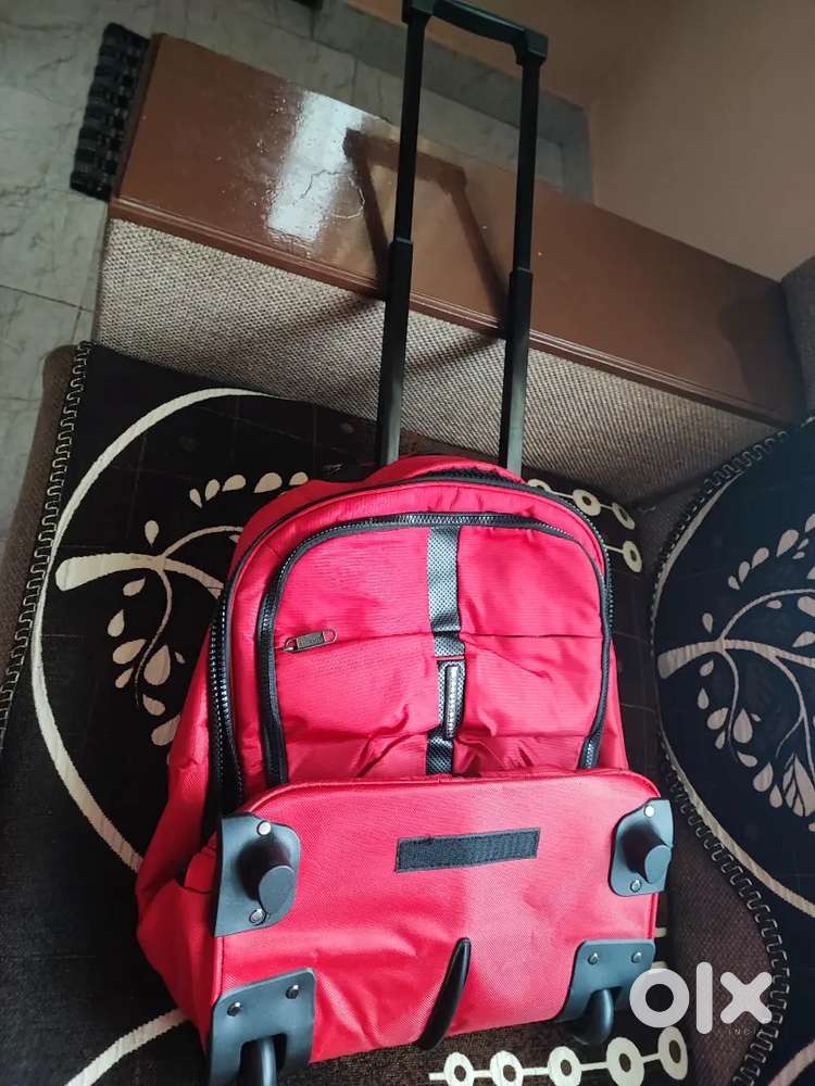 Traveling bag pack with trolley