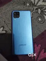 Samsung Galaxy f12 4/64 with bill and boxand charger