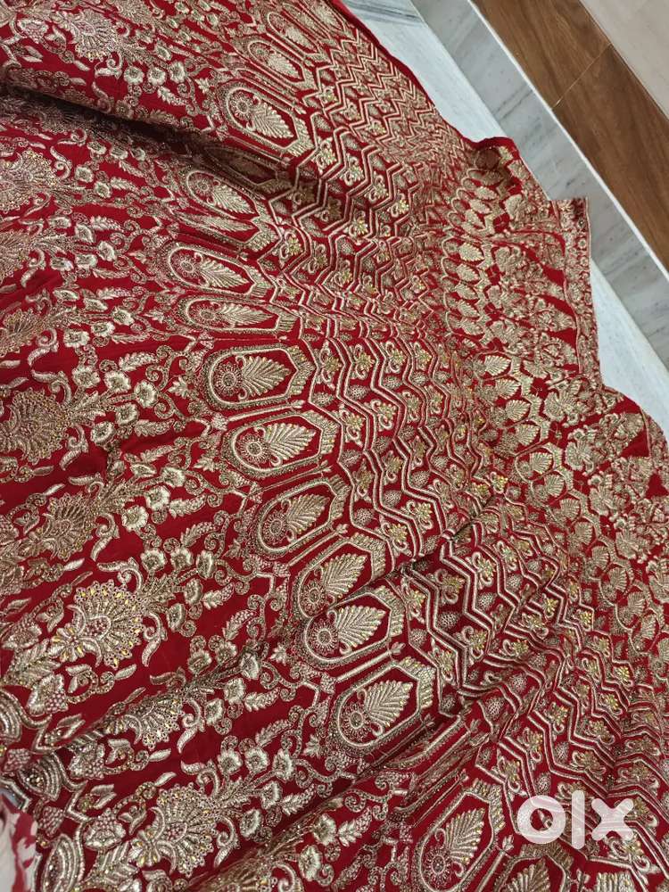 Bridal red lehnga new without stitching blouse