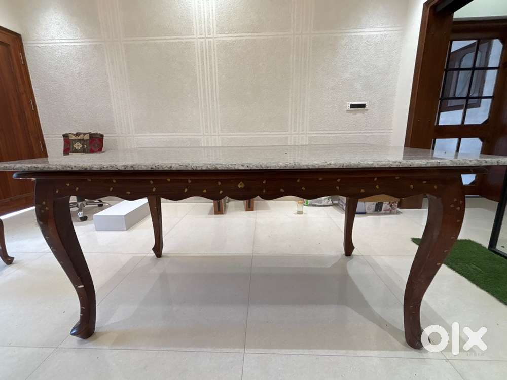 Dining table for sale with granite marble top.