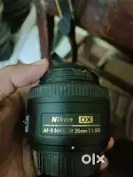 NIKKON D7000 with 300mm standard lens and prime lens 1.8G NIKKOR