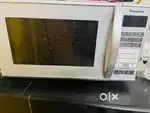 Panasonic27 LtrsConvectionMicrowave and Wooden assembling Doll house