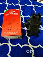 Mobile holder with vibration dampener for motorcycle