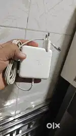 L shape charger for macbook original but used in class condition.