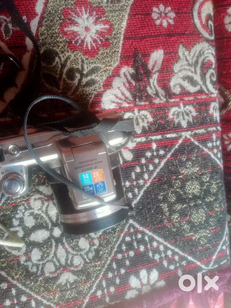 Olmpus sp800uz camera sell krana h please tell me price
