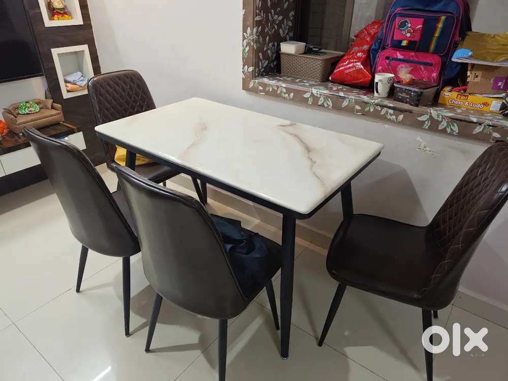 Dining table 4 seater marble top caution chair
