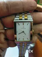Titan watch sales day and date watch good running condition