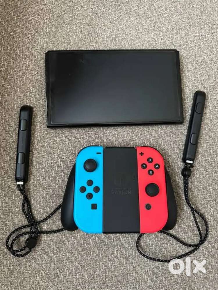 Pre owned Nintendo switch OLED with games