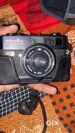 Minolta Hi Matic camera old version good condition with leather cover