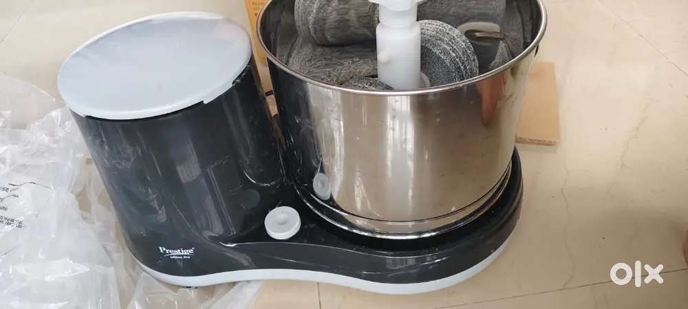 New branded Prestige Dosa idli atta maker with stone roller grinder.