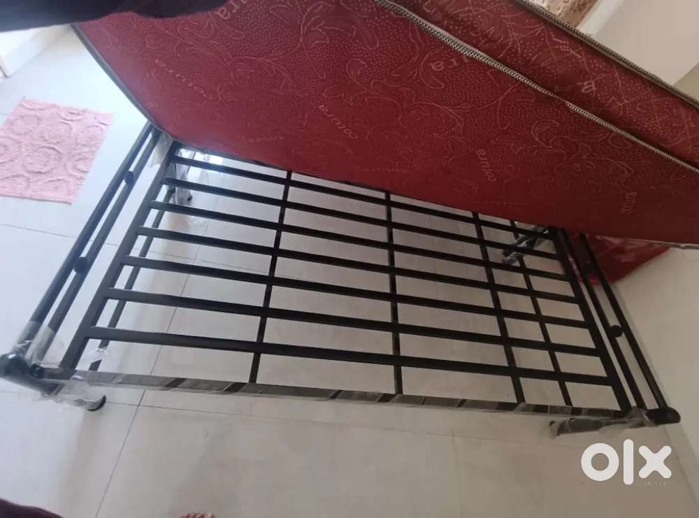 Three iron cots and a mattress .. available individually
