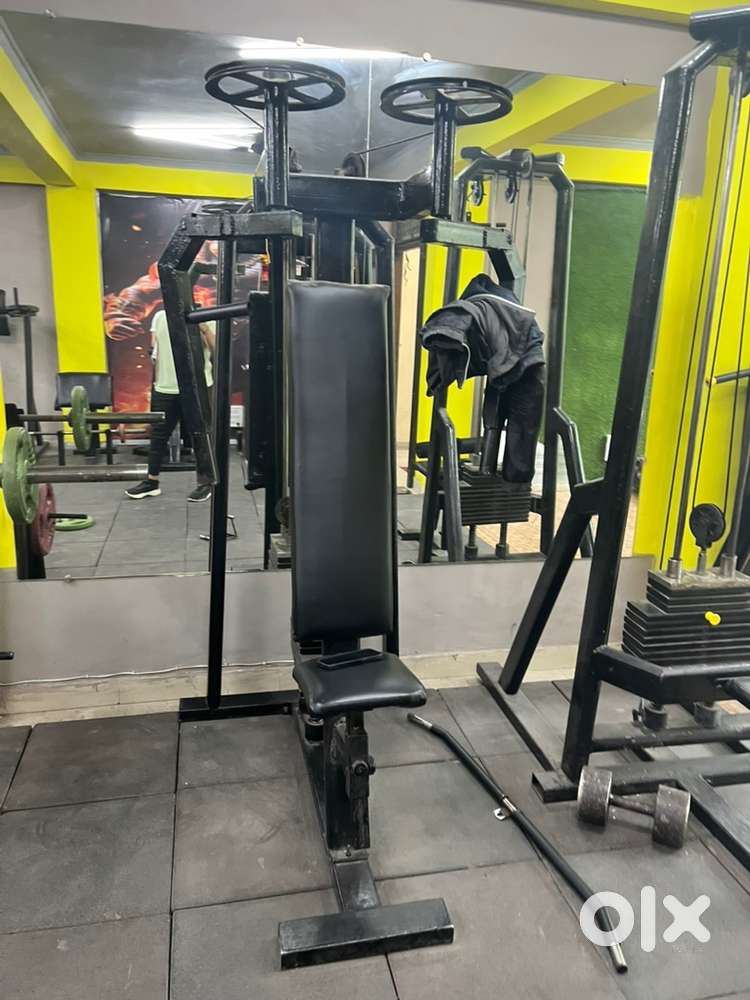 Pecdec fly or lat pull down or leg press
