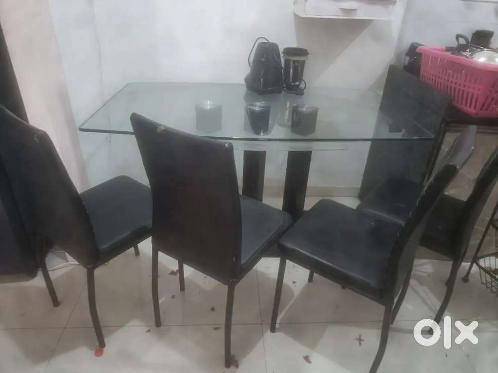 Glass top dining table
