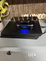 Sony PS4 with Two Controllers and 6 Games
