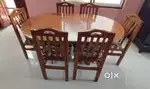 Oval shape dining table with chairs