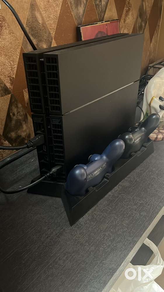 PS4 + 2 Controllers and stand at 18k