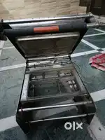 Thalis & container packing machine