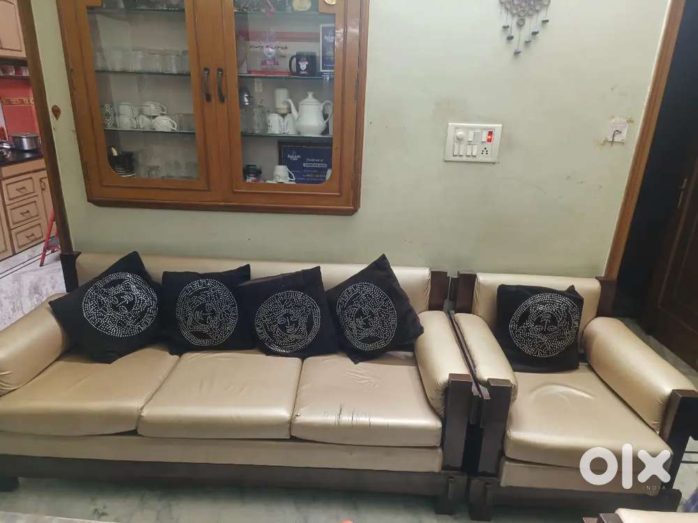 Teakwood sofa and table