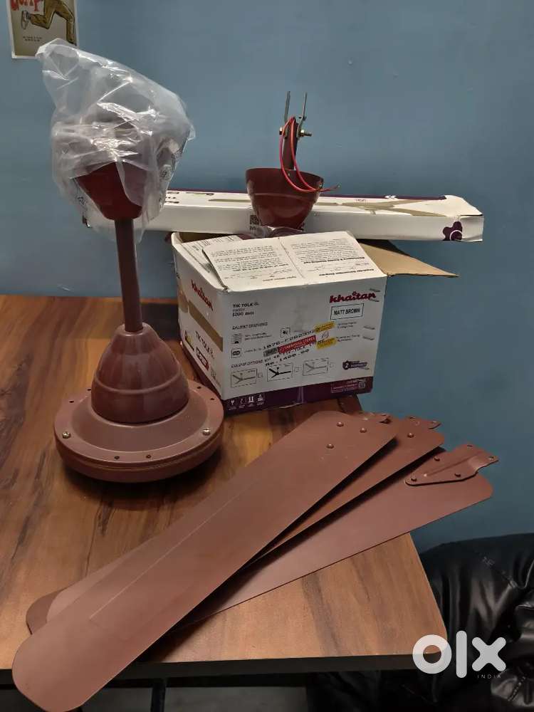 Recently purchased matte brown ceiling fan in excellent condition,