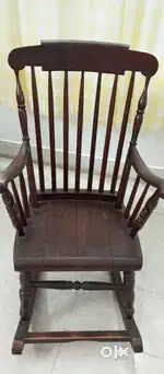 Rocking chair in teak wood