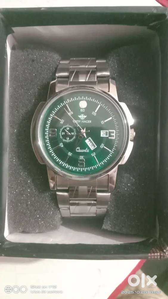 Eddy Hager Green Dial Silver Strap Men’s Watch (Model EH-229-O-LIVE)