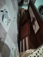 6x6 bed along with a bedsheet