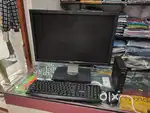 Dell computer setup with tiny CPU and 22 inches screen