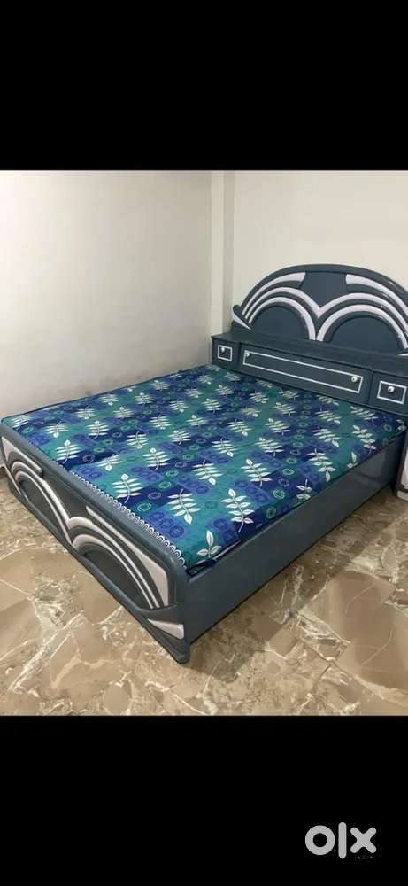 Double bed with mattress with side table