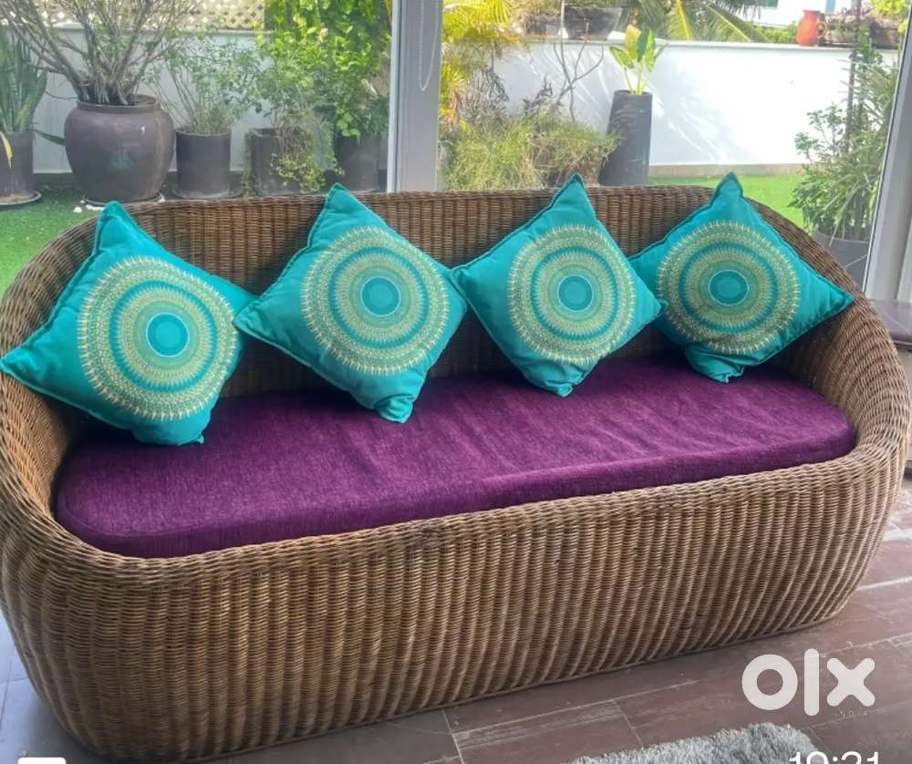Cane sofa with cushions @
