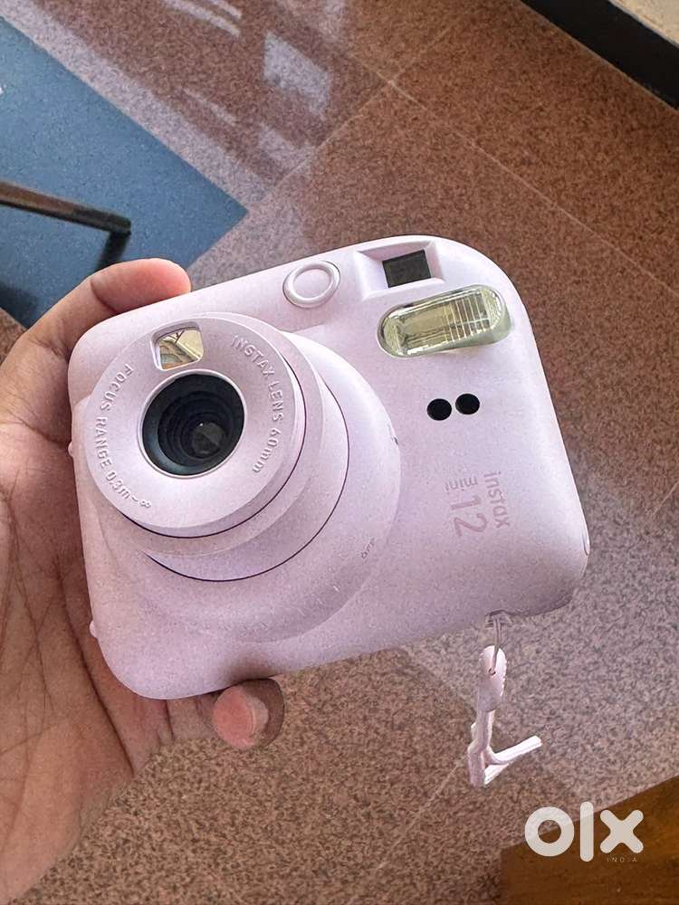 INSTAX MINI- 12, cute , compact, super easy to use, in best condition.