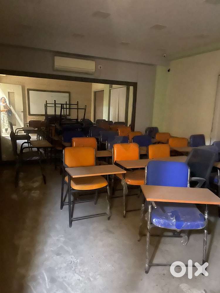 Chairs with writing pads and computer chairs