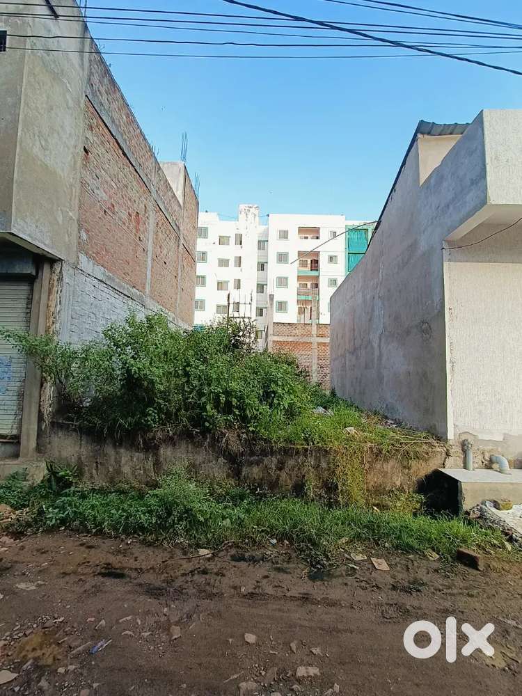 Plot on main road