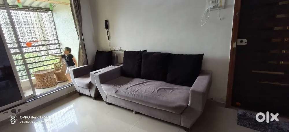 4 seater Sofa for sale with pillows Price  10000 negotiable