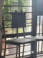 Six seater dining table with glass top