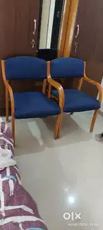 Wooden 2 chair with covers very good condition