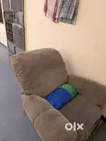 Recliner, plus rocking,one seater sofa