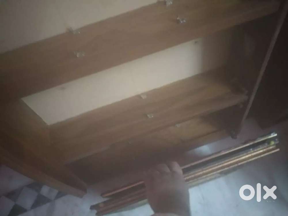 2 wooden cabinets with glass shutters