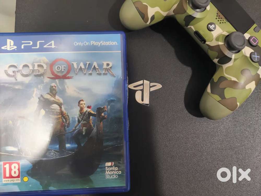 PS4 PRO WITH GOD OF WAR FREE WITH CAMO CONTROLLER