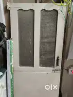 Wooden door with glass panels